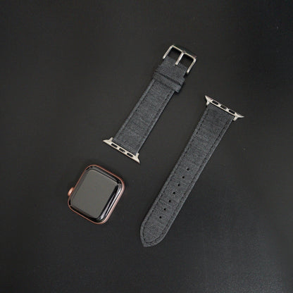 Featured image of the Apple Watch Medium Light Grey Herringbone band
